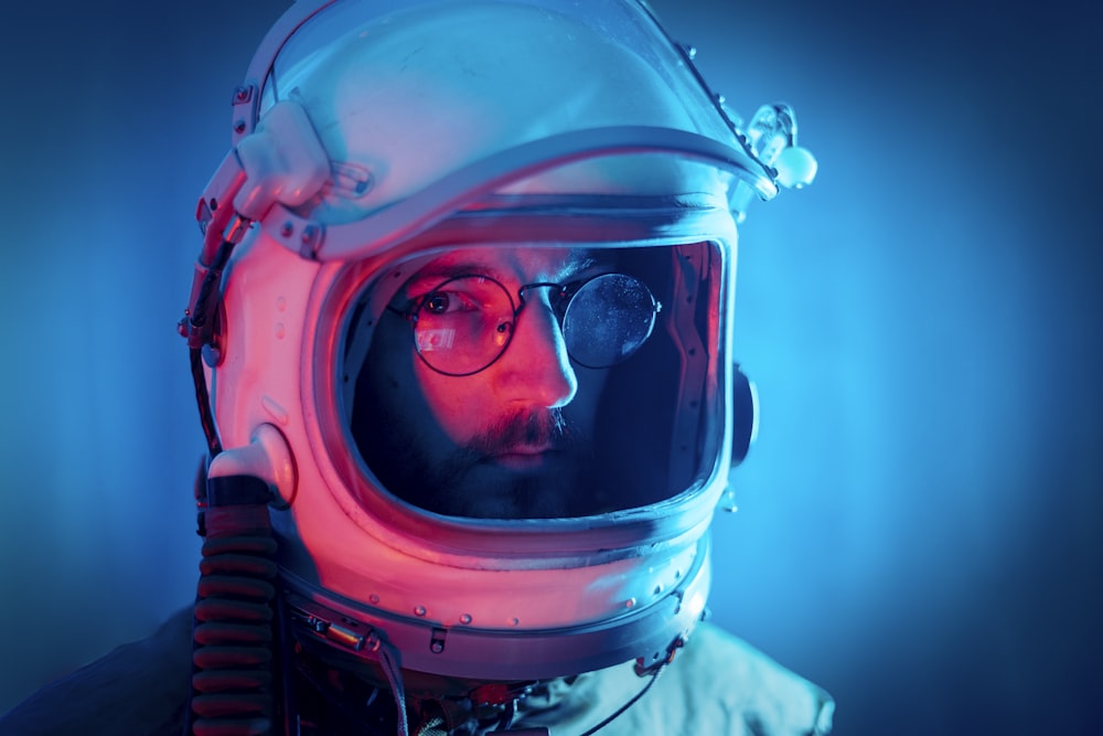 a man wearing a space suit and goggles