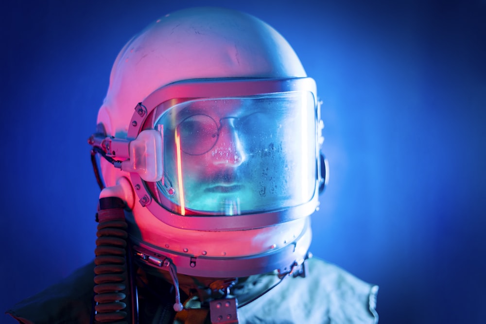 a man in a space suit with a gas mask