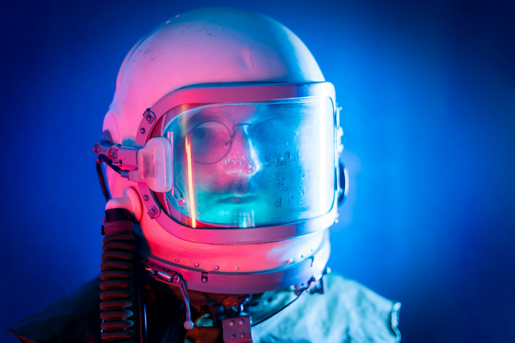 a man in a space suit with a gas mask