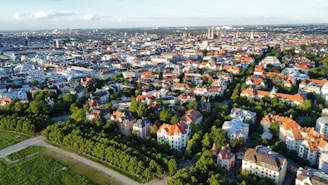 an aerial view of a city with lots of trees