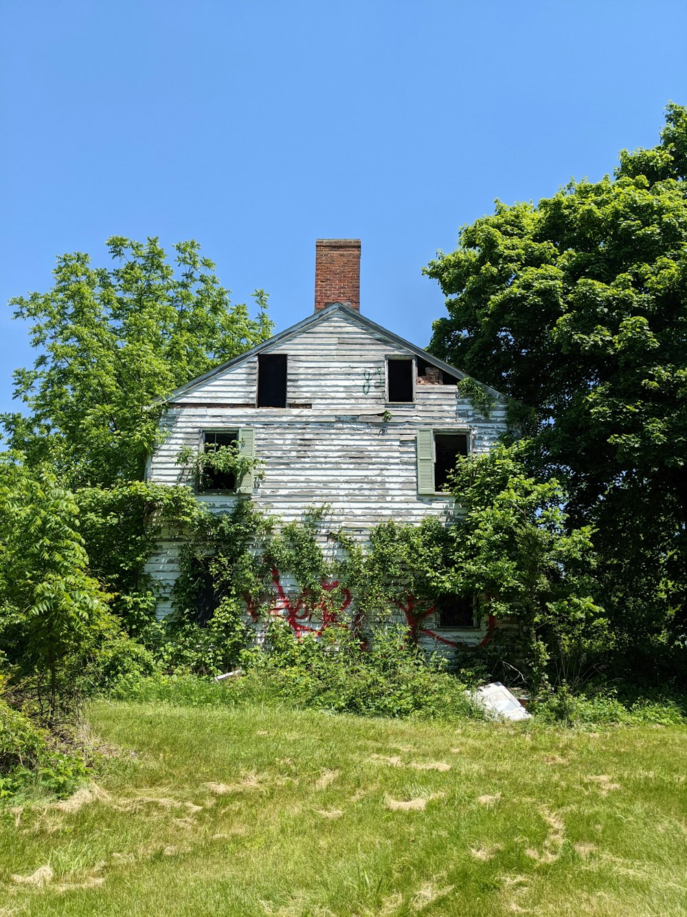 an old run down house in the woods