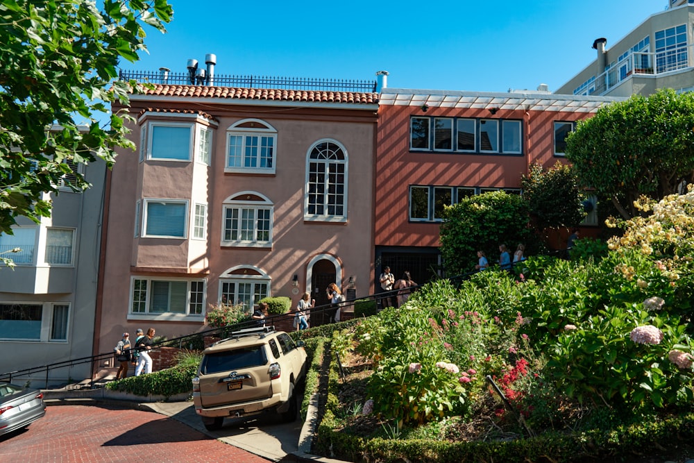 a car is parked in front of a building