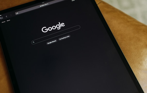 a close up of a cell phone on a table