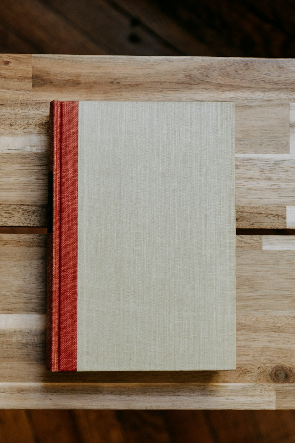 a book sitting on top of a wooden table