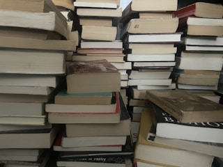 Stacks of donated books ready to be delivered to a school library.