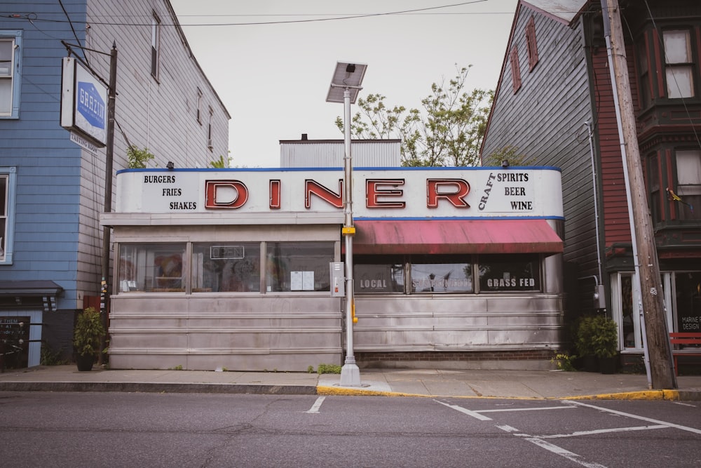 a diner on the corner of a city street