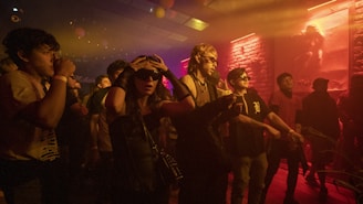 People enjoying a lively social event with music and dancing.