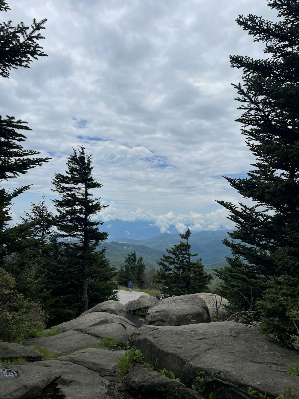 a view of the mountains from the top of a mountain