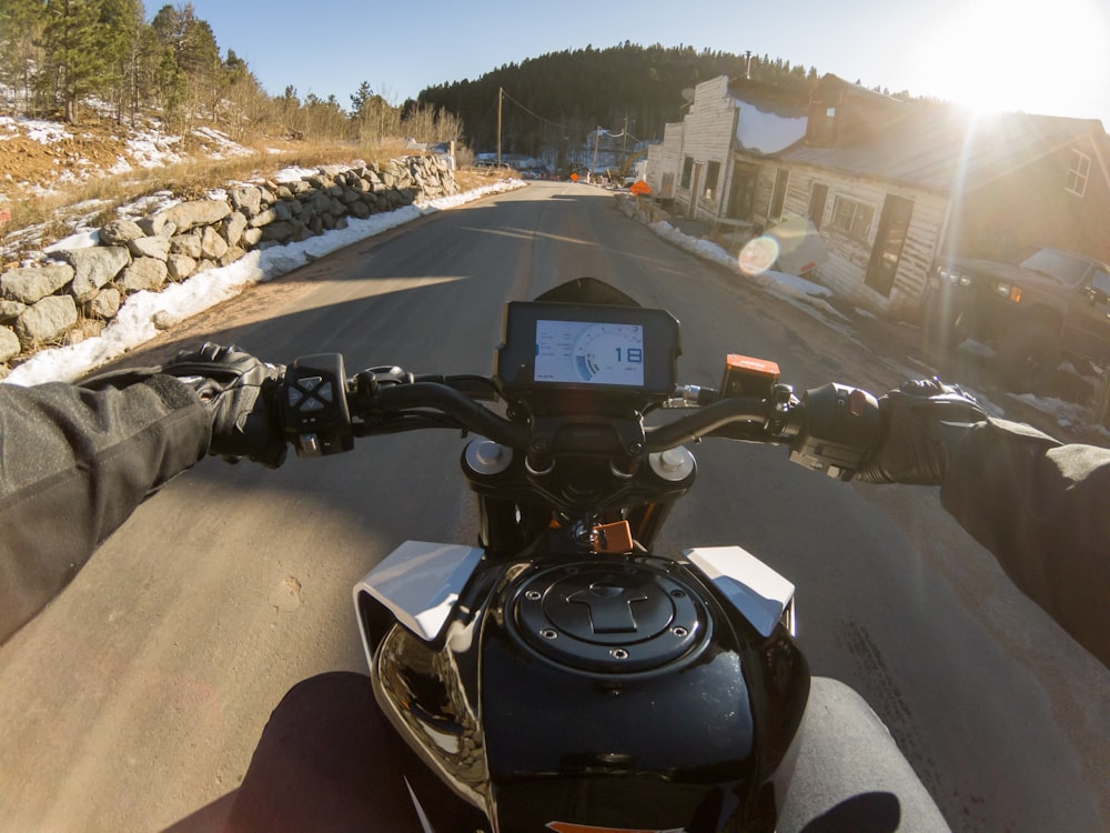 a person riding a motorcycle on a road