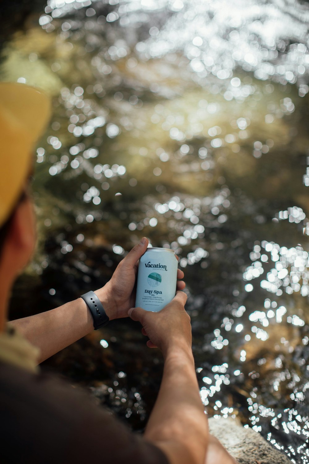 a person is holding a small device in their hand