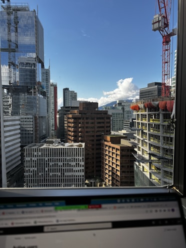 a laptop computer sitting on top of a desk