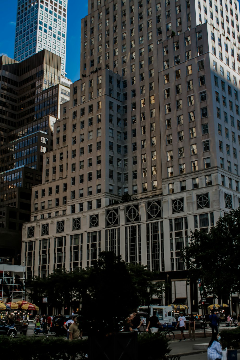 a group of tall buildings in a city