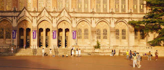 A welcoming entrance of Deen Institute with banners displaying upcoming events.