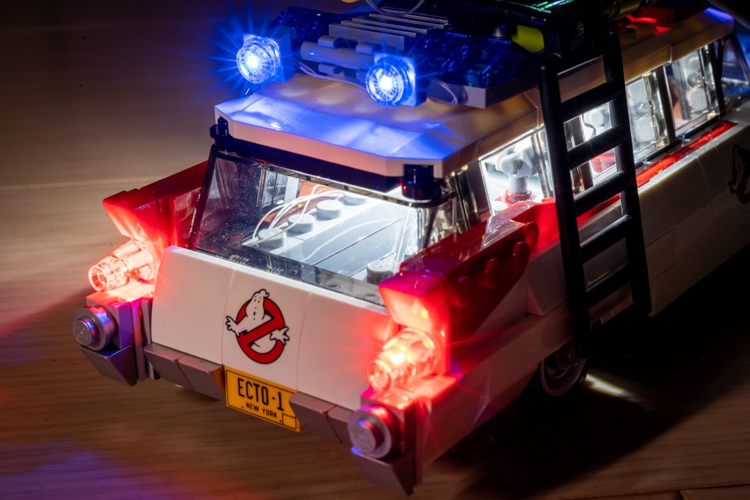 a toy fire truck with its lights on,