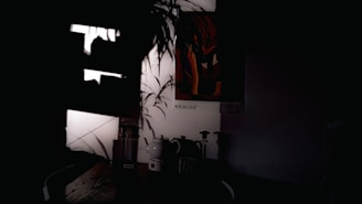 A softly lit corner with a steaming teapot, wooden table, and a small potted plant beside a window.