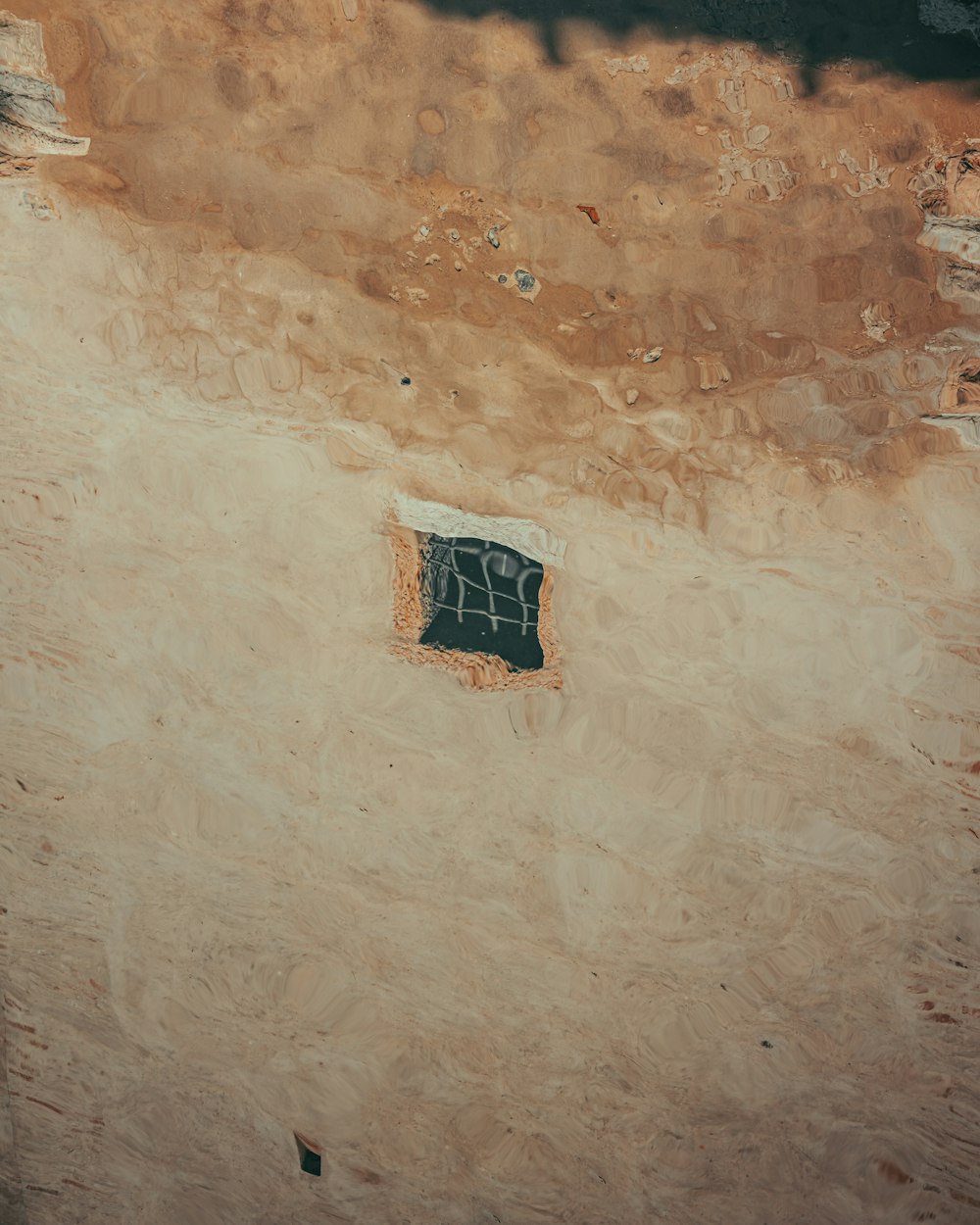 a small window in the side of a building