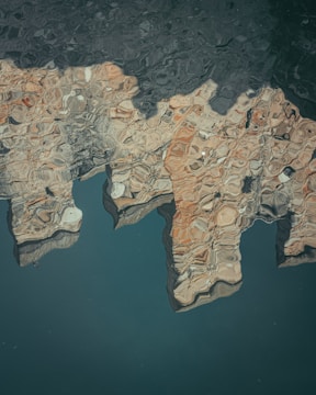 a reflection of a building in the water