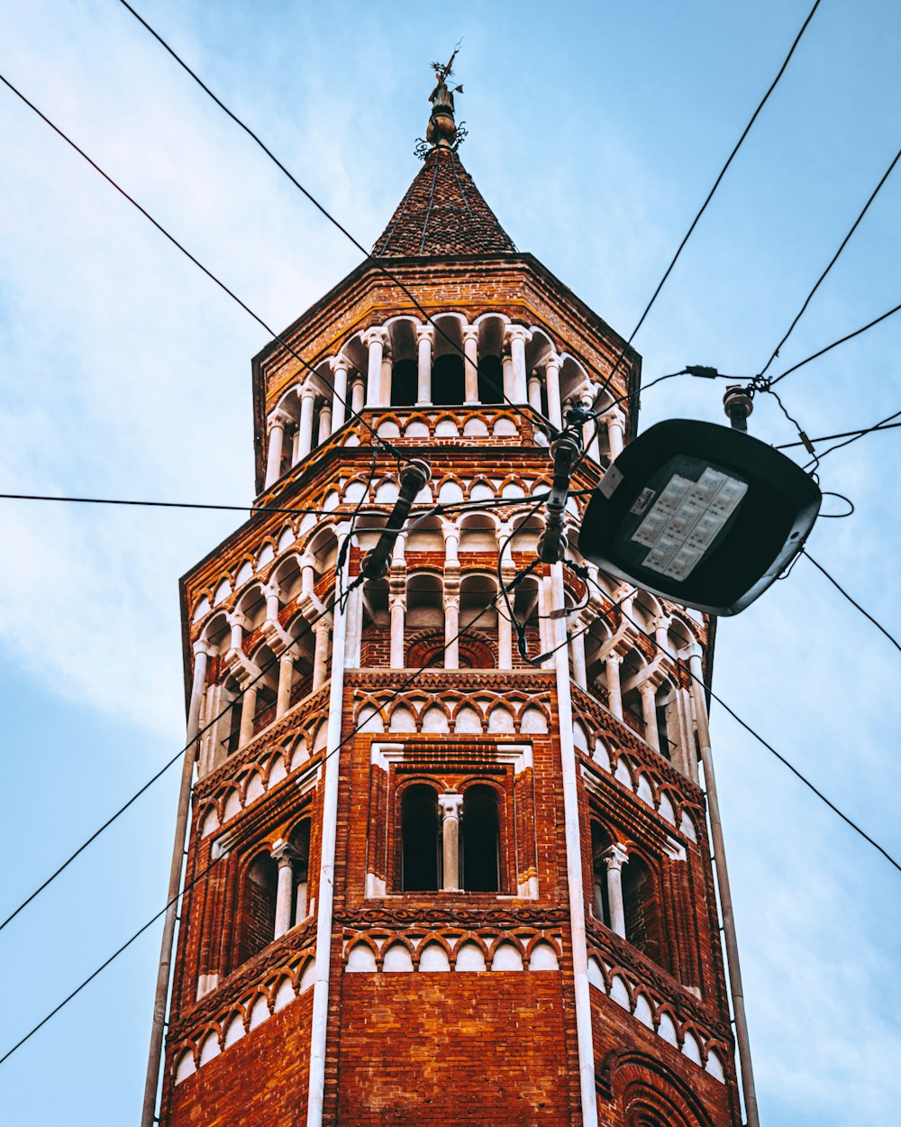 a tall tower with a clock on the top of it