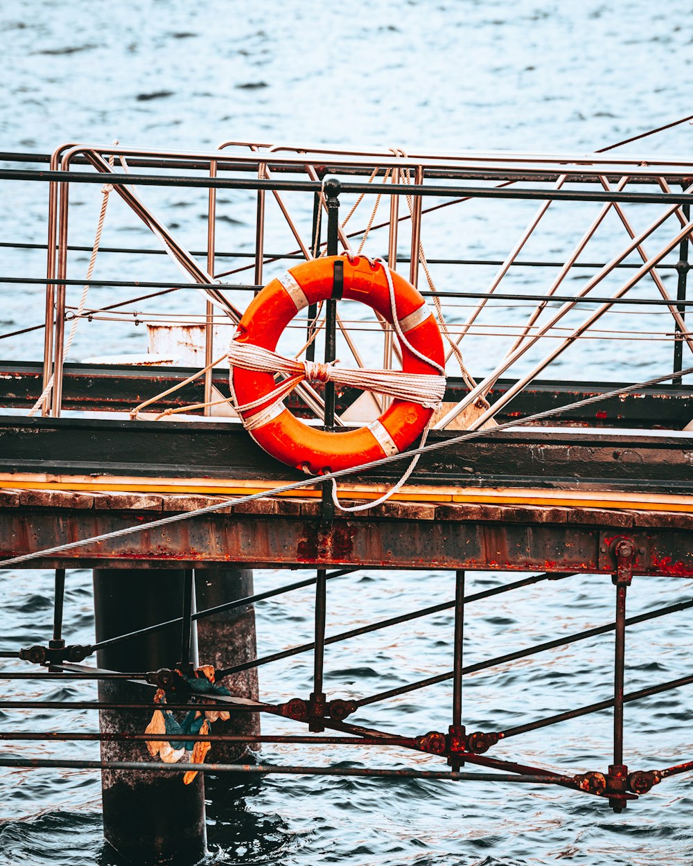 a life preserver on a dock in the water