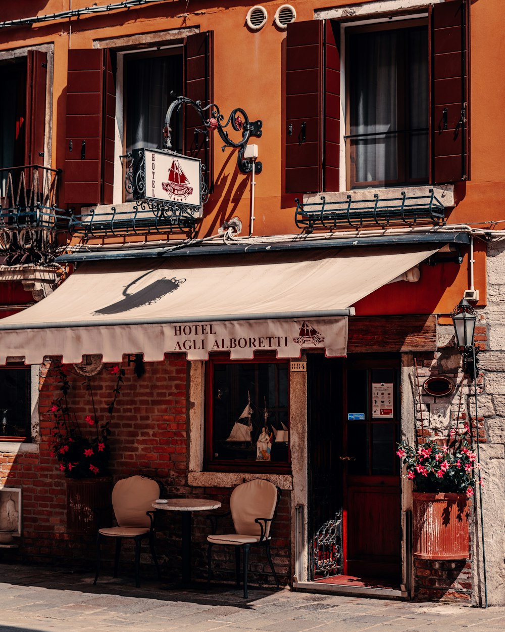 a building with a white awning on the outside of it