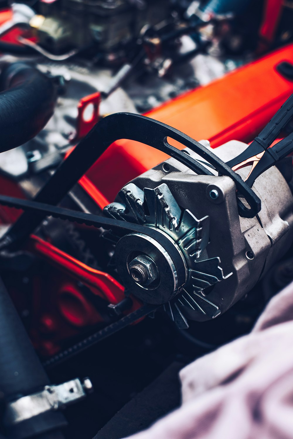 a close up of a motorcycle engine and gear