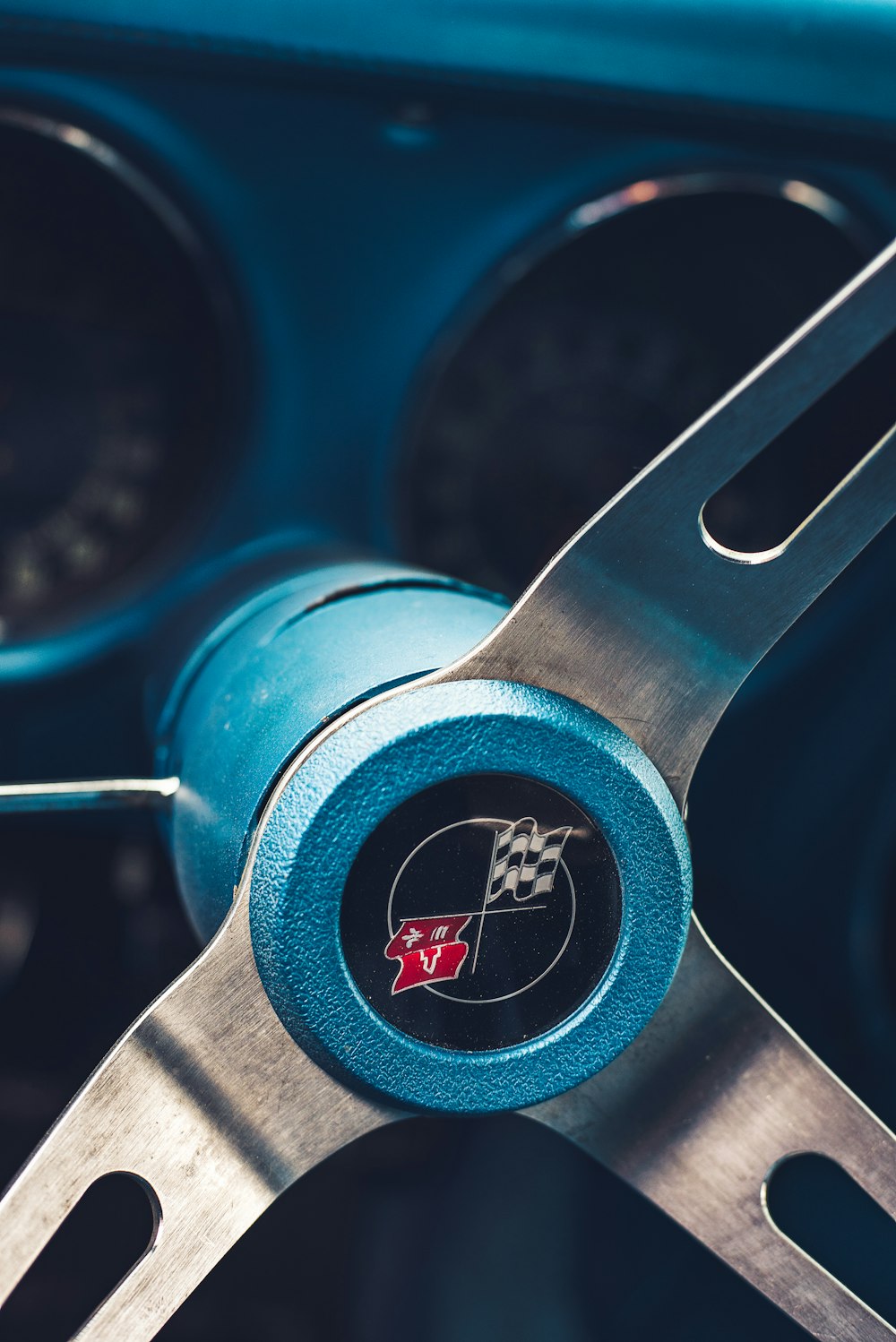 a close up of a blue steering wheel