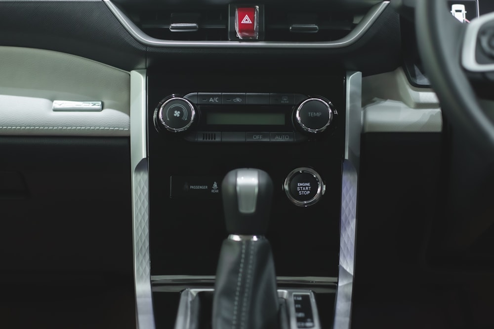 a close up of a steering wheel and dashboard of a car