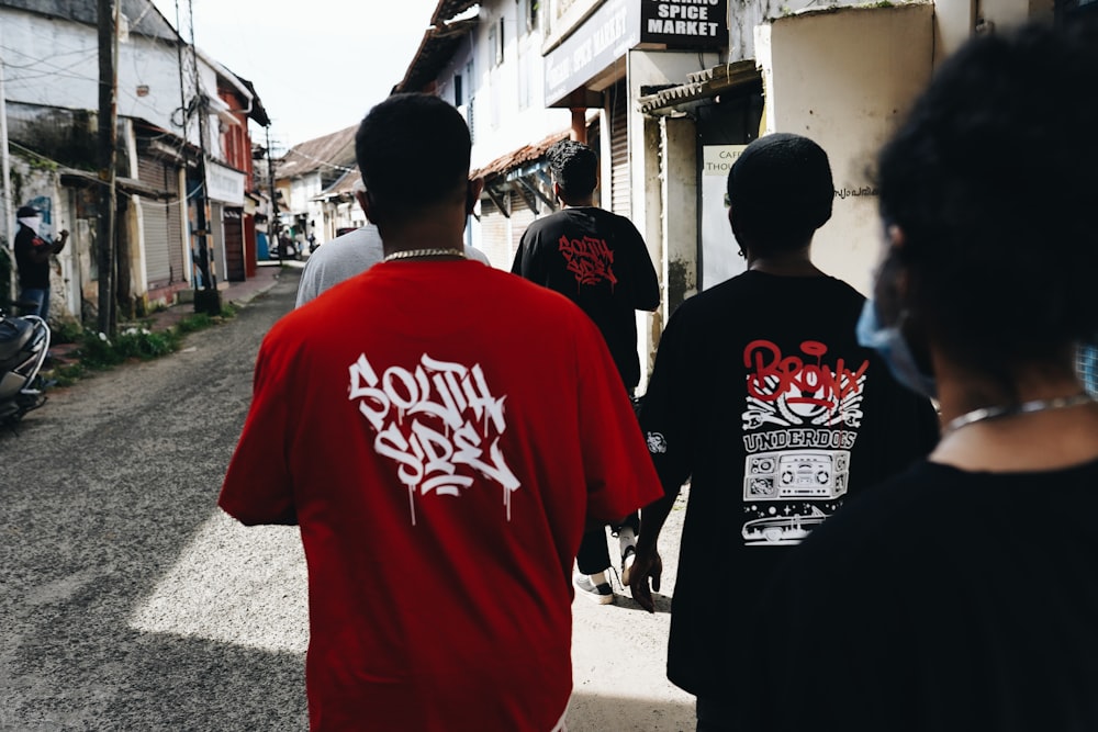 a group of people walking down a street