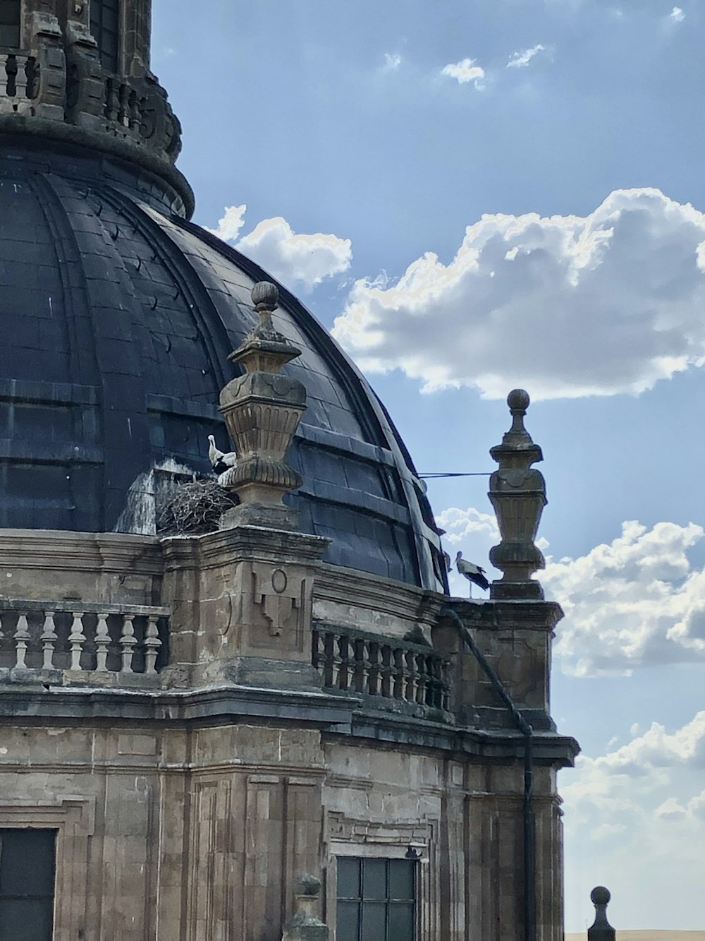 a large dome with a clock on the top of it