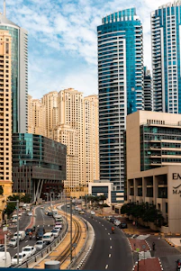 a city street with a lot of tall buildings