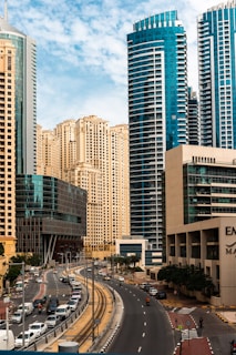 a city street with a lot of tall buildings