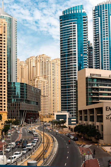a city street with a lot of tall buildings