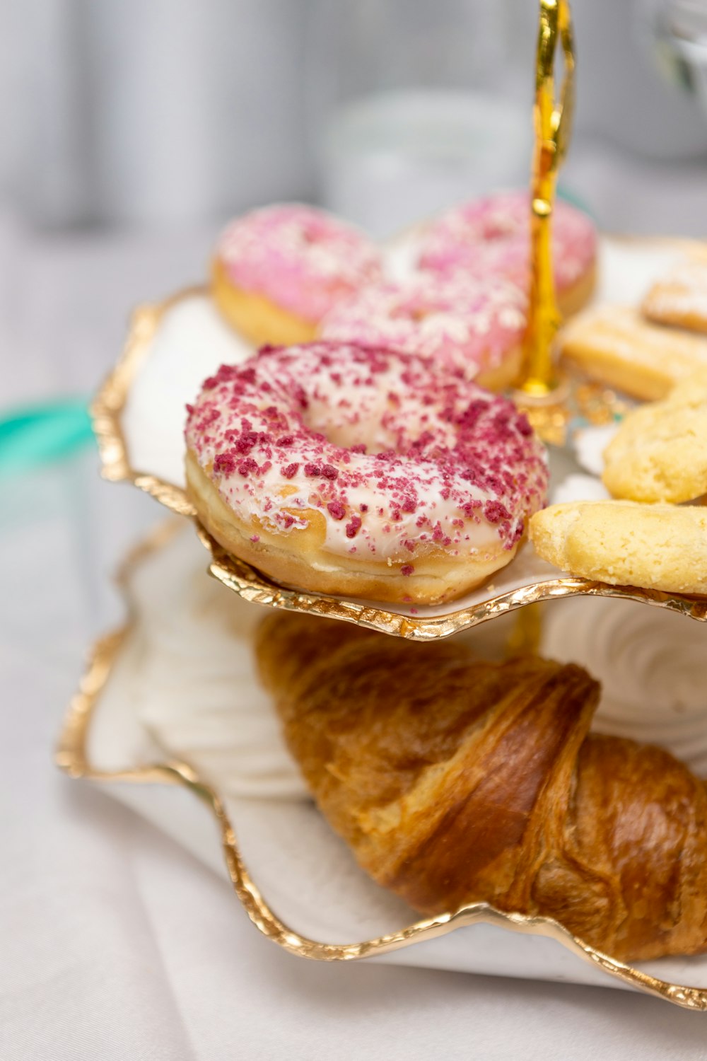 a plate with a variety of pastries on it