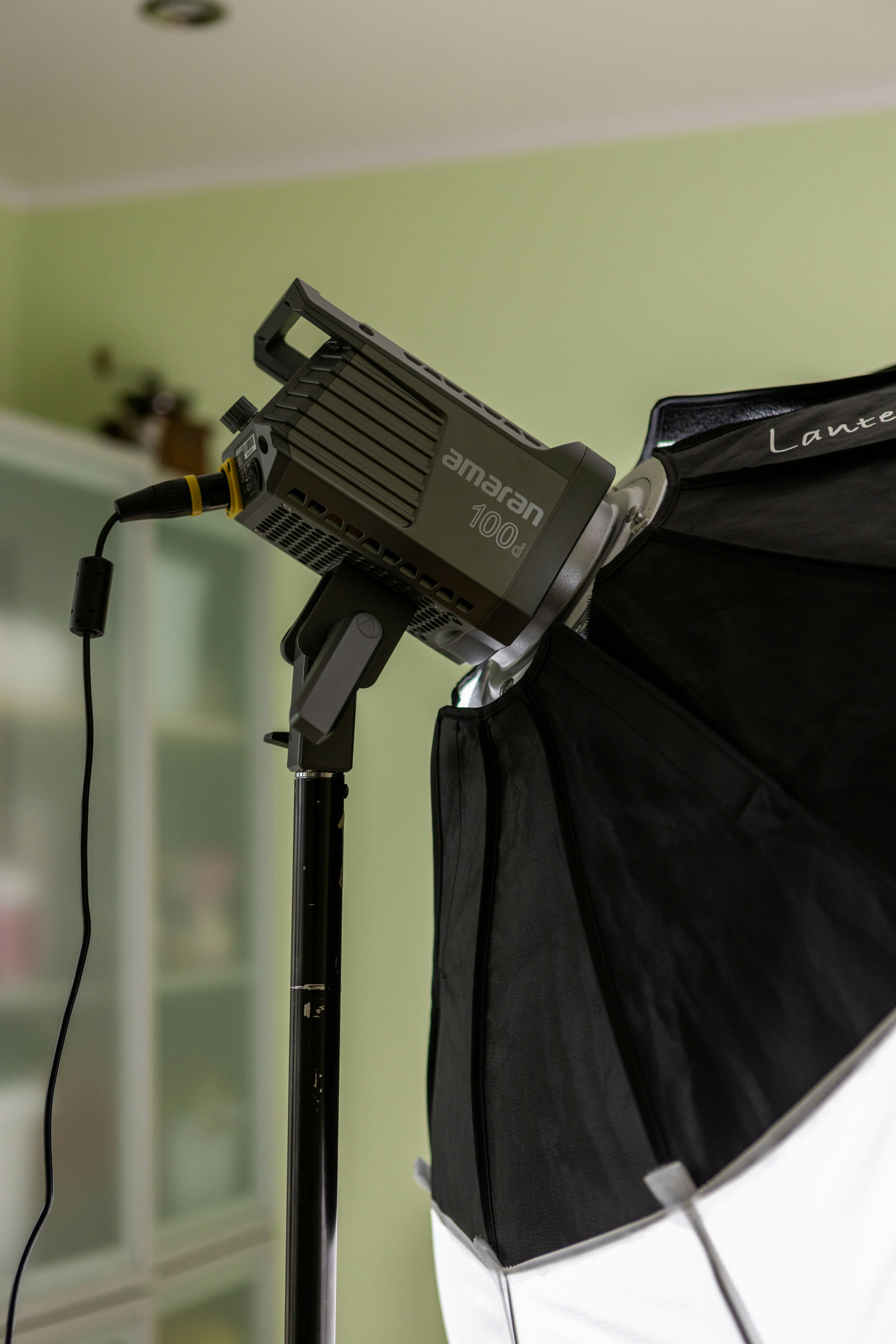 A black and white umbrella and some lights photo Free Photo shoot