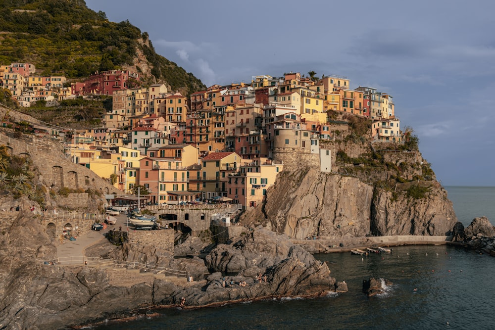 a village on a cliff overlooking the ocean