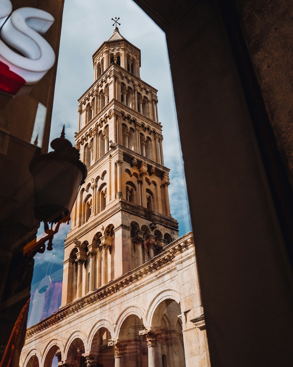 a tall tower with a clock on the top of it