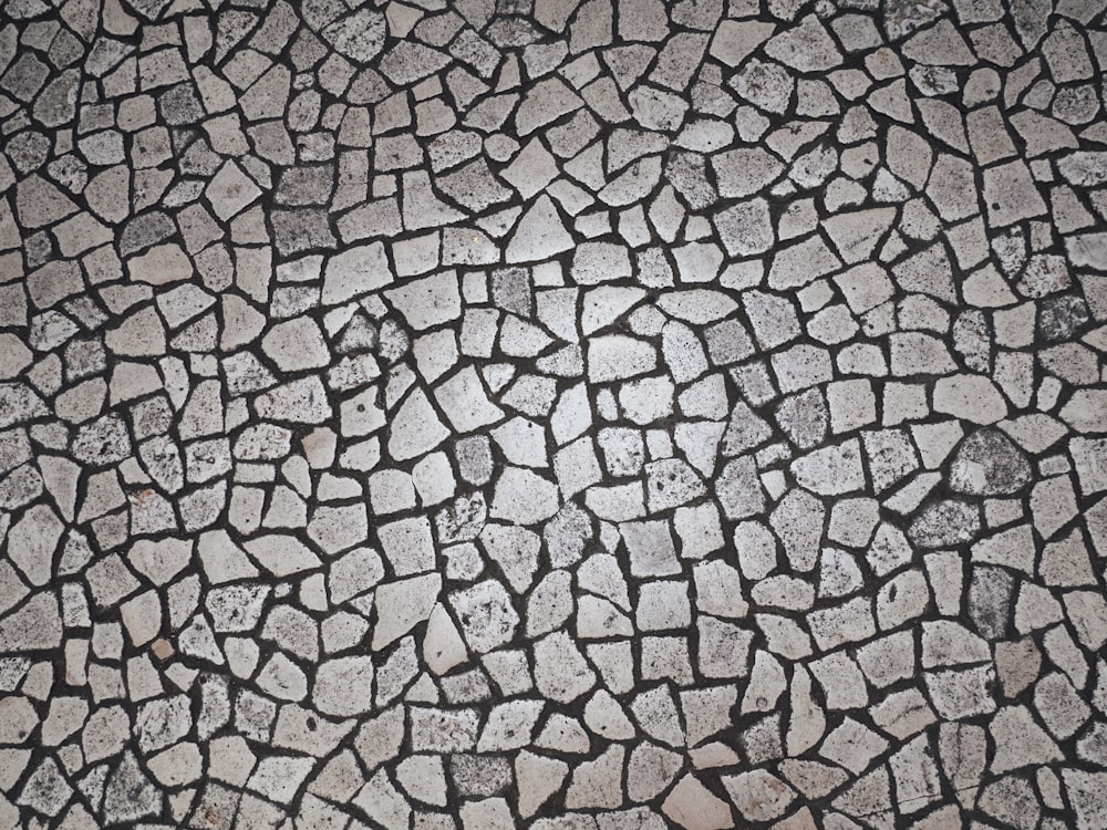 a close up of a cobblestone pavement