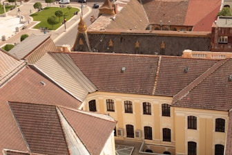 an aerial view of a building with a clock tower