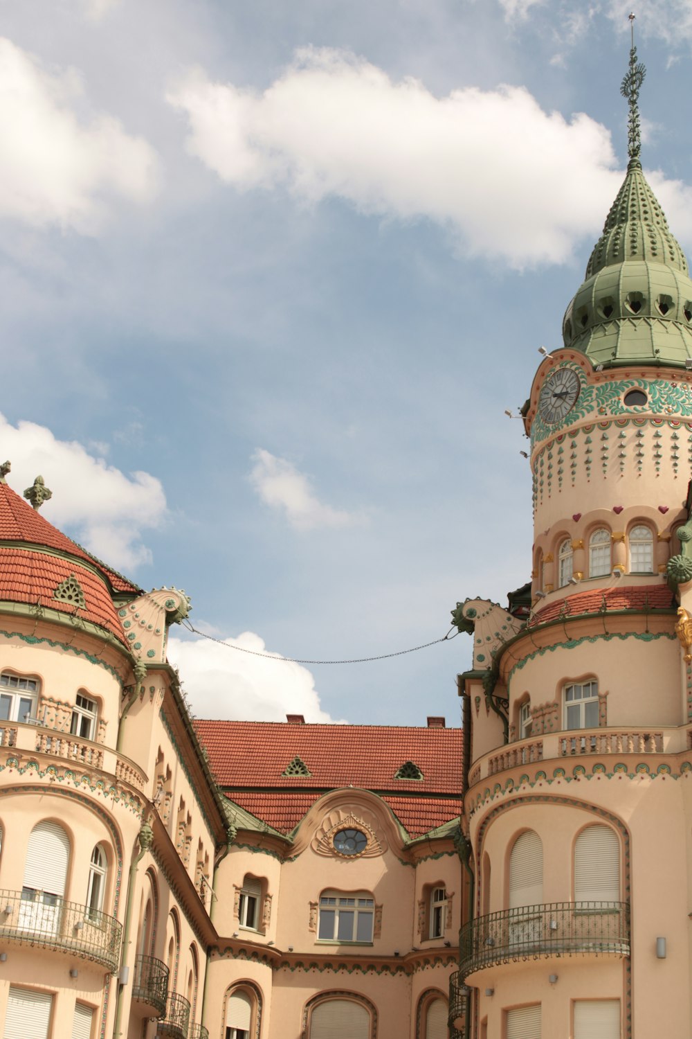 a large building with a clock on the top of it