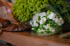 Close-up of a vibrant natural bouquet with delicate Korean paper accents.