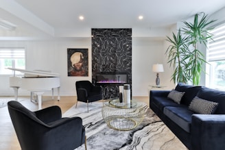 a living room filled with furniture and a piano