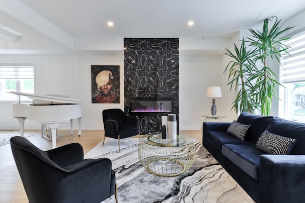 a living room filled with furniture and a piano