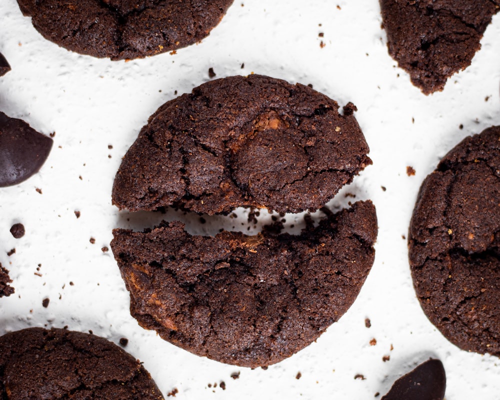 a chocolate cookie with a bite taken out of it