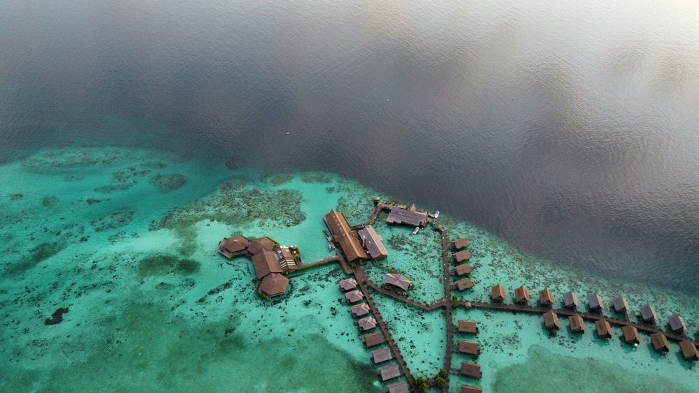 an aerial view of a resort on a tropical island