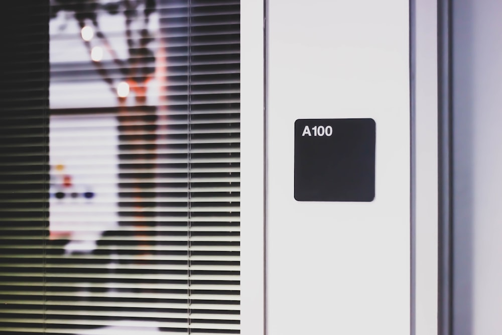 a close up of a window with a sign on it