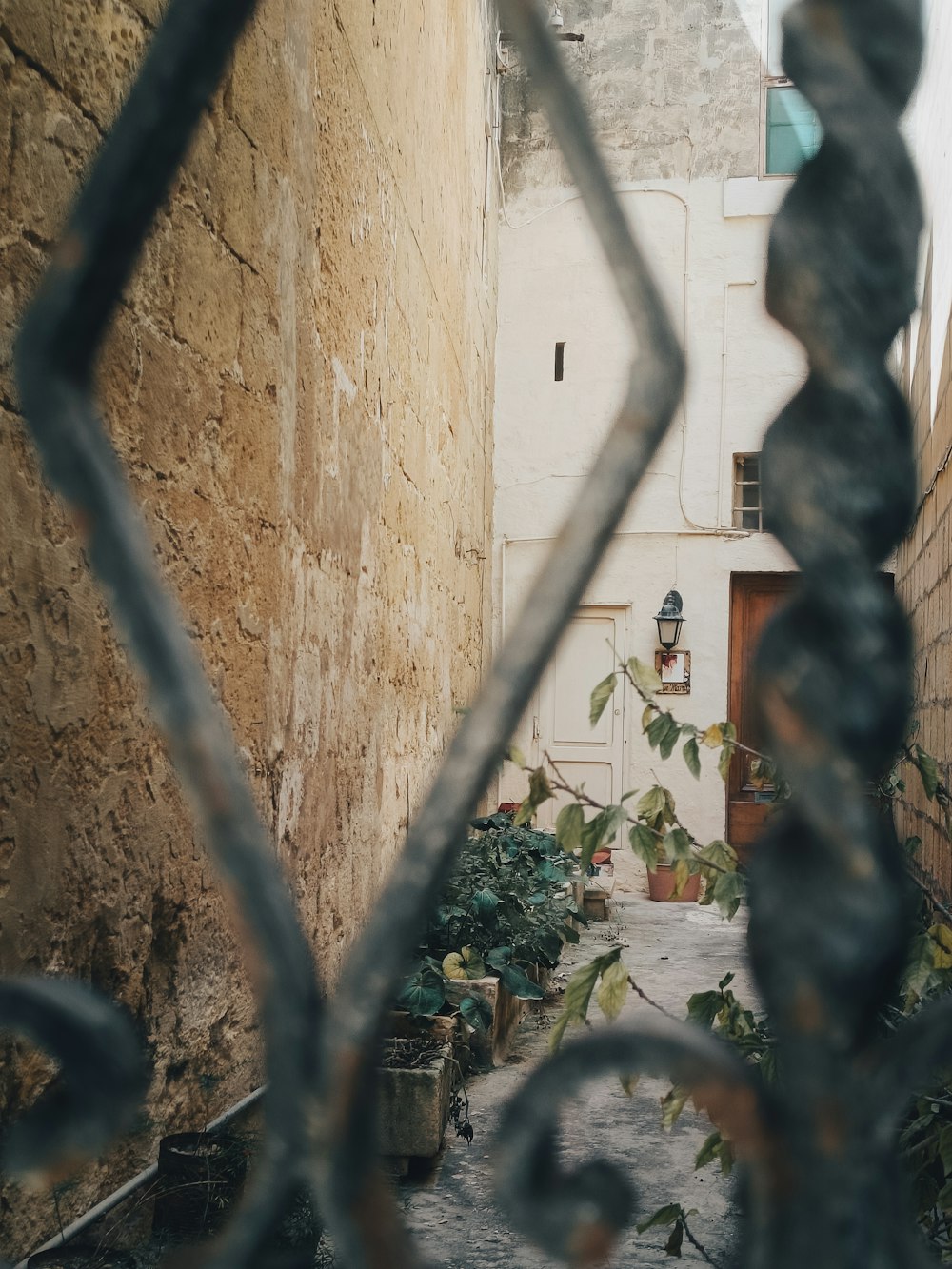 a view of a building through a gate