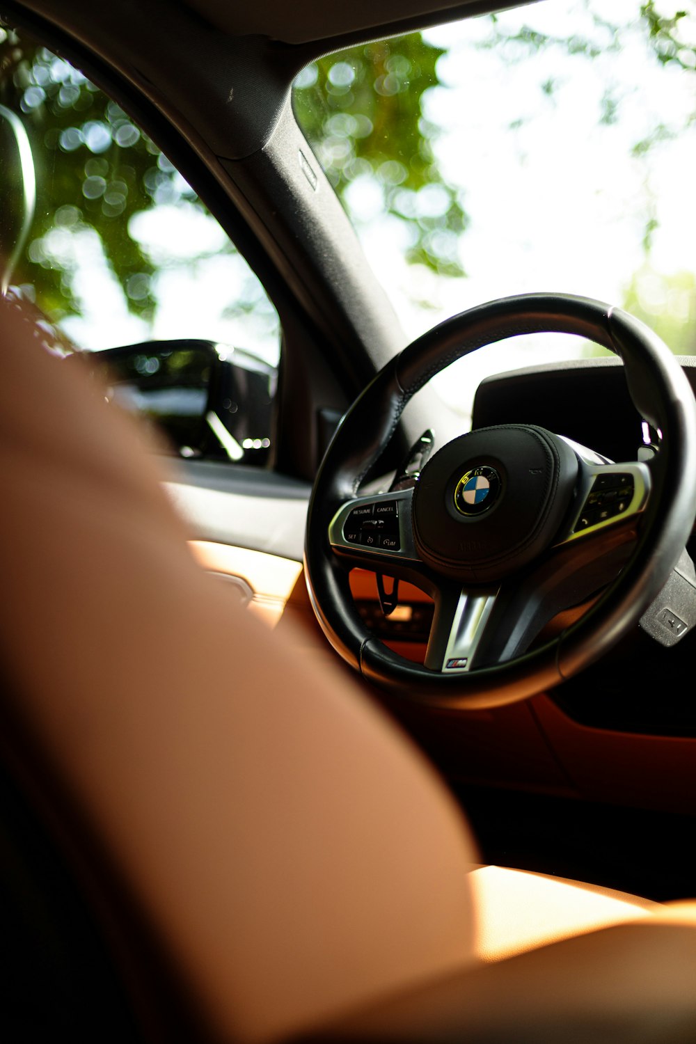 the interior of a car with a steering wheel