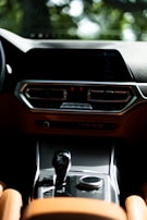 Close up of the car dashboard featuring modern technology and elegant design