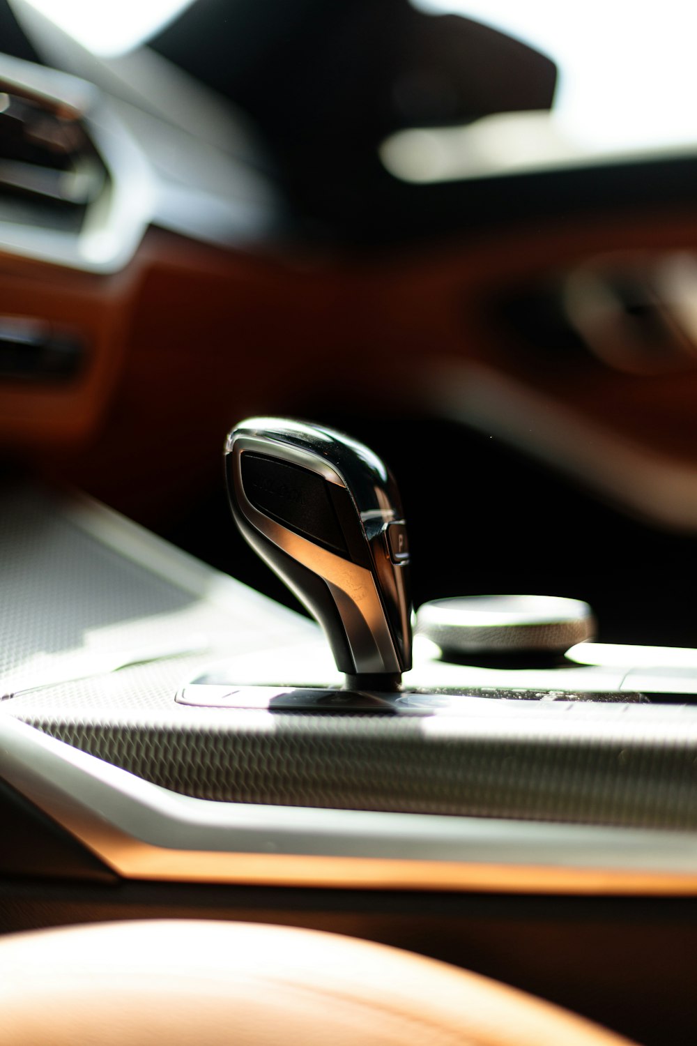 a close up of a car dashboard with a steering wheel