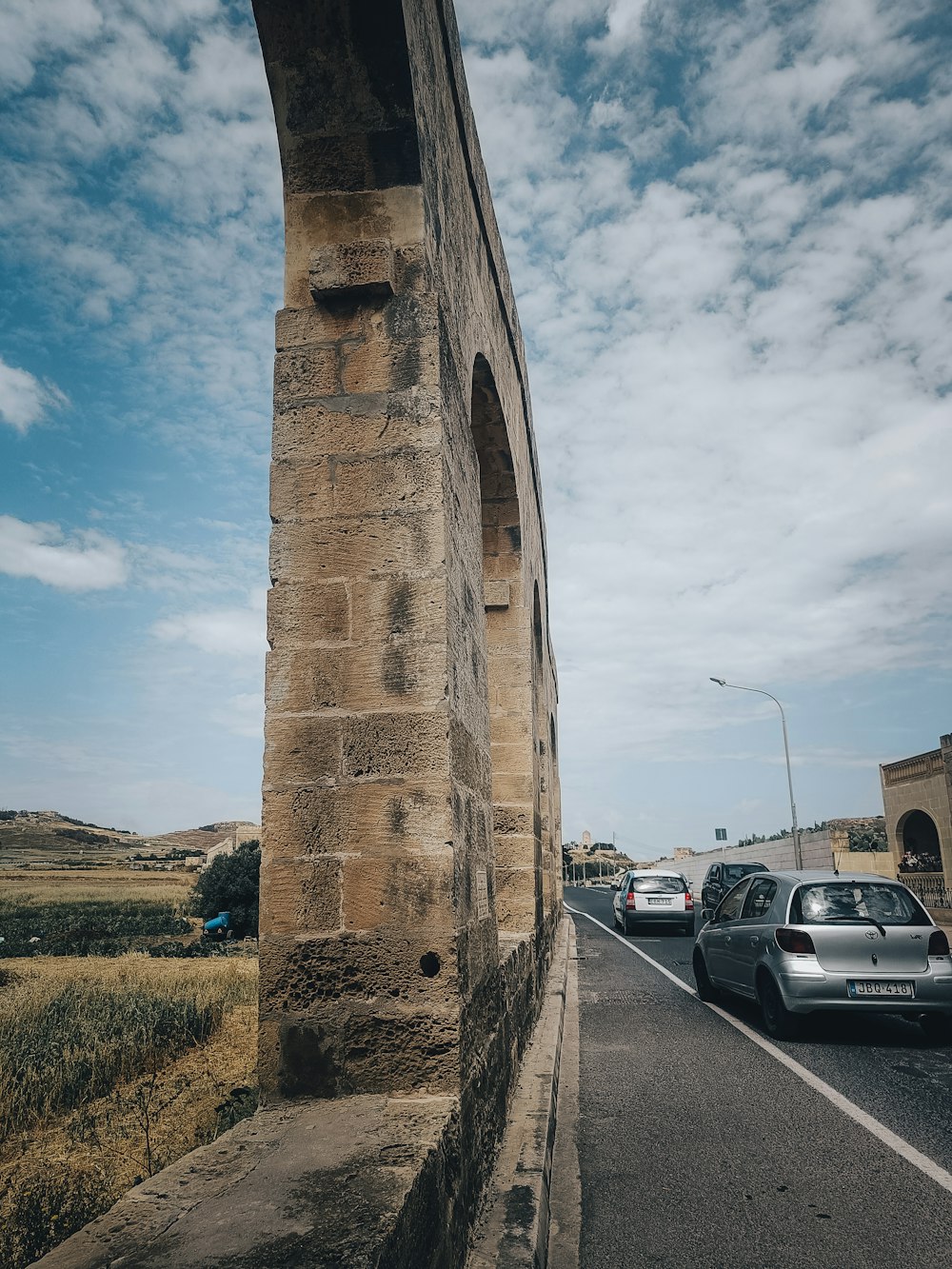 cars are parked on the side of the road